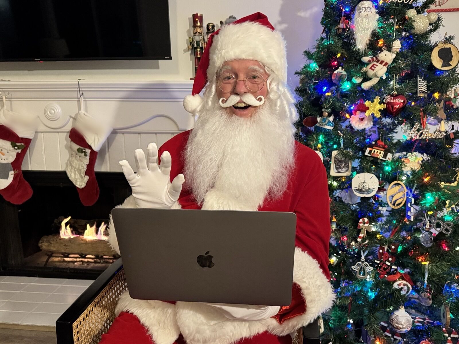 Santa in his velvet suit on a video call